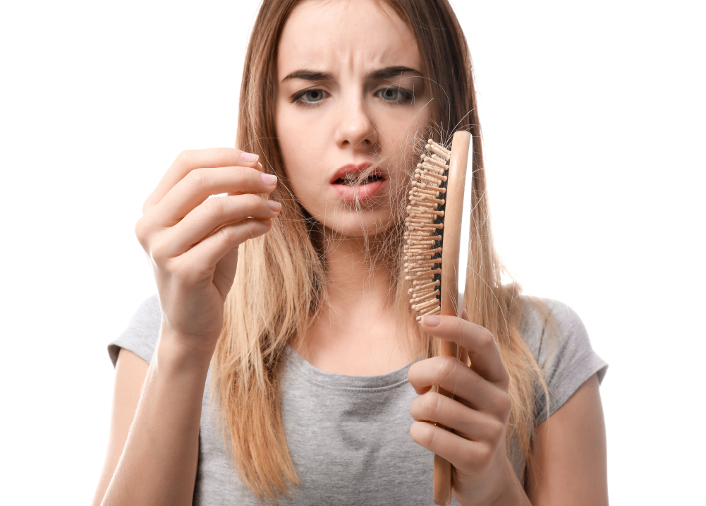 Mujer con caída del cabello
