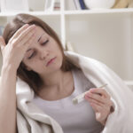Mujer con fiebre